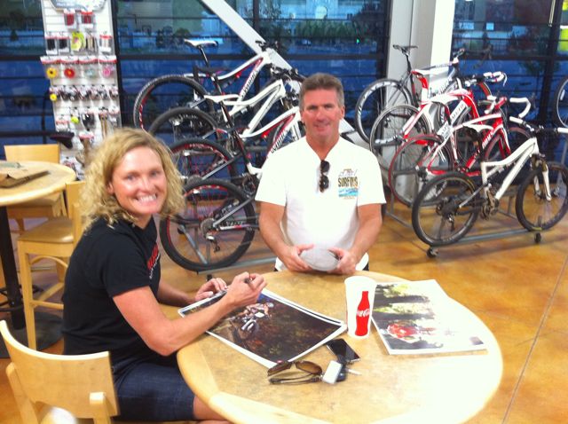 bingham-cyclery-signing-posters-with-melanie-mcquaid