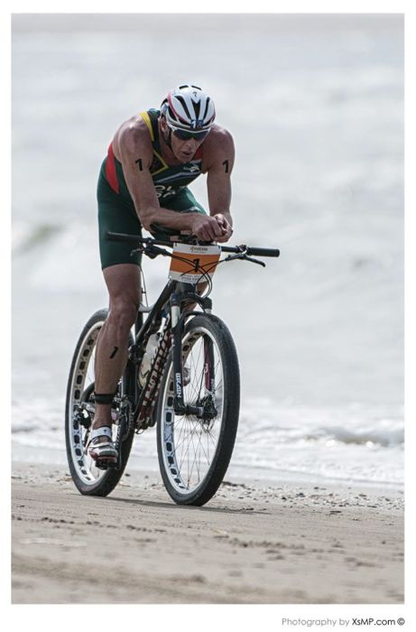 Conrad Stoltz Caveman Specialized Sworks Epic, Evade Helmet, Oakley radar,  ITU Cross Triathlon World Champs 2013 - Conrad Stoltz XTERRA Triathlete