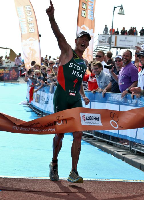 Conrad Stoltz caveman ITU Cross Triathlon Worlds 2013 finish Hoka One One Specialized