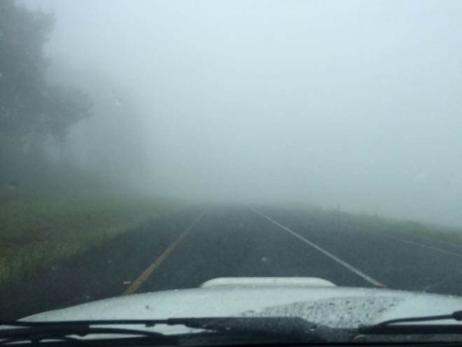 Conrad Stoltz Caveman misty drive over LongTom pass