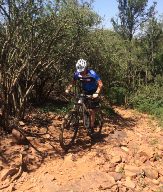 Conrad Stoltz Caveman Skills Clinic Deryck climbs rocks text book style